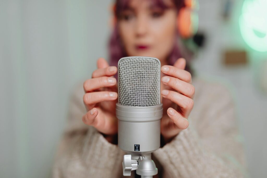 Talent Bridge Hindi Voice Over Artist Professional voice recording equipment with microphone pop filter audio interface and computer screen showing audio editing software waveforms
