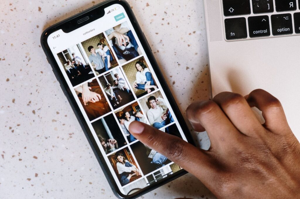 Work From Home Live Photo Collection | Telus Digital AI Data Collection App Person working from home on Live Photo data collection study using smartphone and TELUS Digital app for remote AI job.